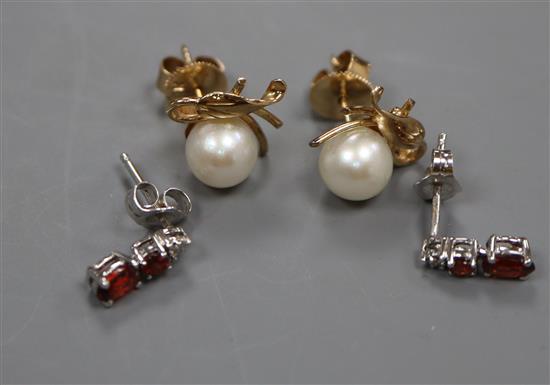 Two pairs of earrings including 14k and cultured pearl and 18ct gold and gem set.